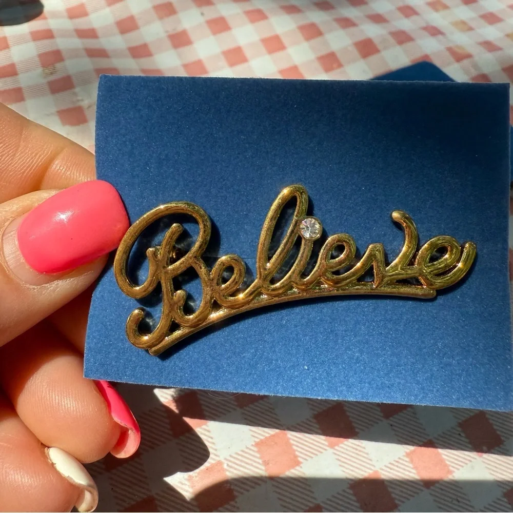 Avon Goldtone “Believe” pin NIB vintage 2007
